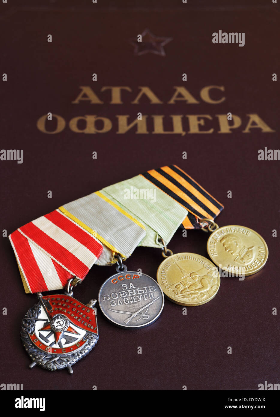 Military medals of the World War II on a Soviet Officer Atlas Stock Photo