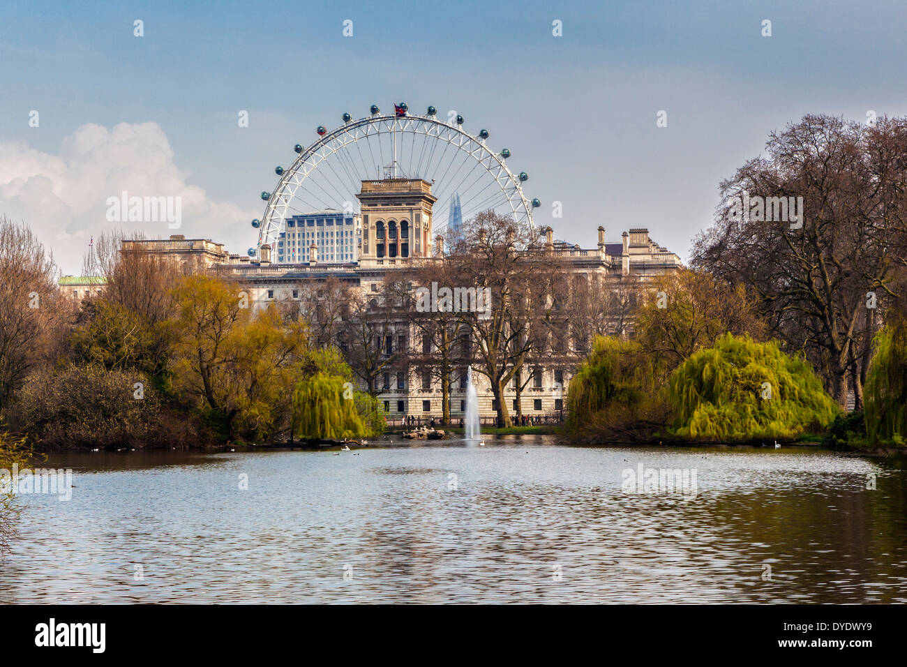 View of Whitehall government buildings and London Eye from St James's park - London, UK Stock Photo
