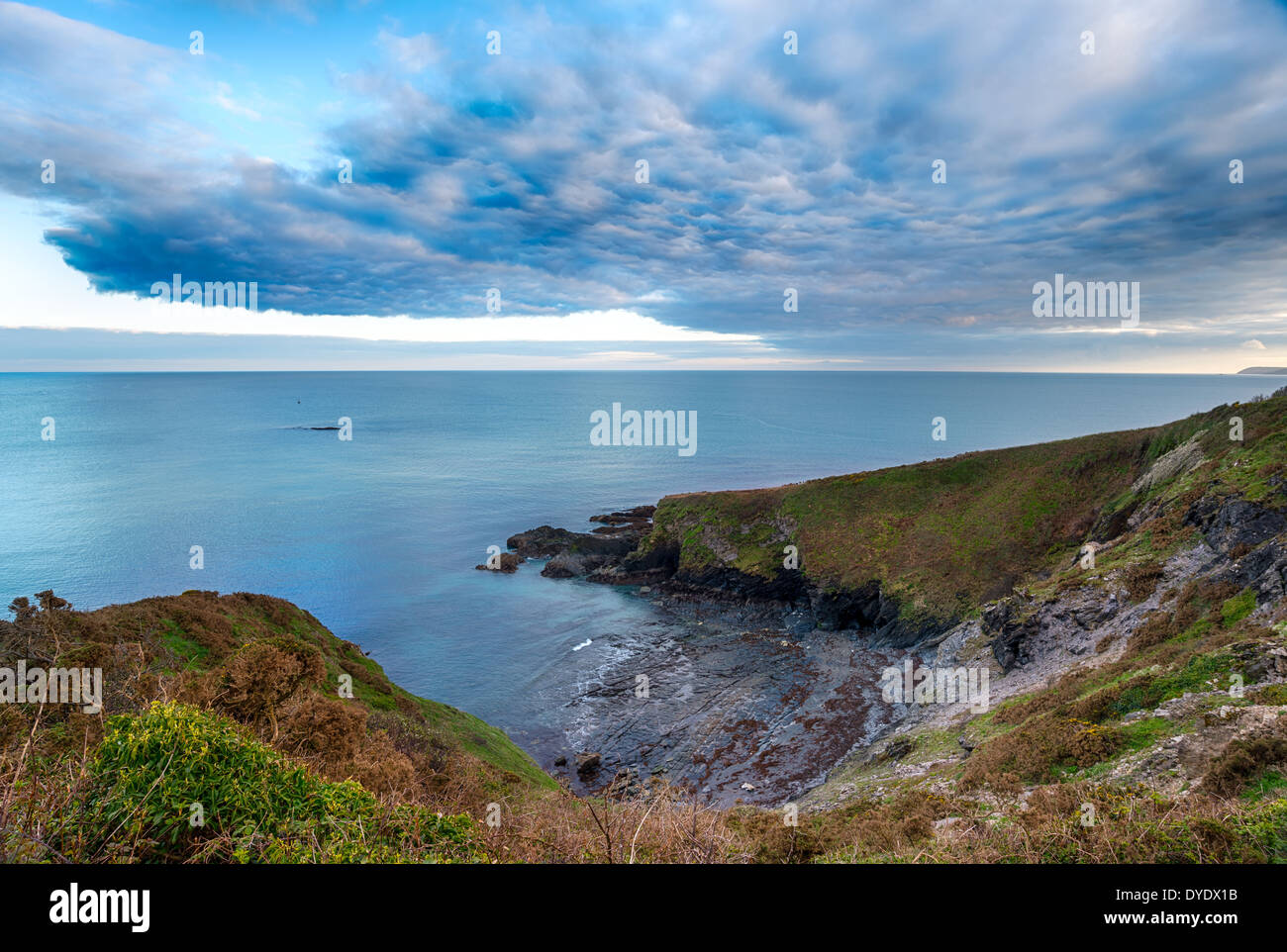 Clouds gather over Gribbin Head near St Austell in Cornwall Stock Photo