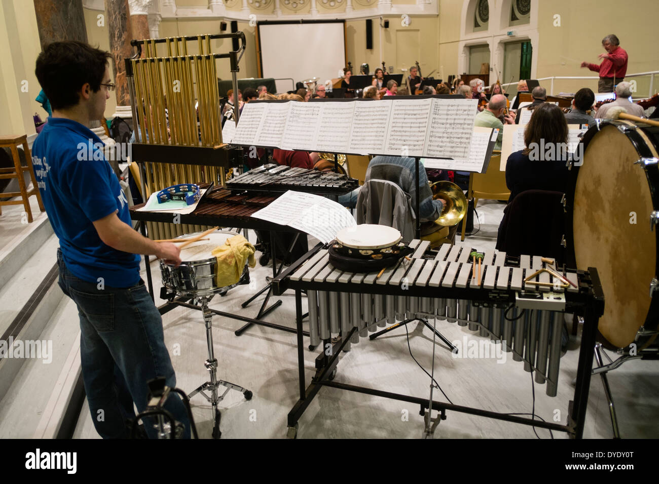 PERCUSSION SECTION Members of an Aberystwyth Philomusica amateur classical music orchestra rehearsing, UK Stock Photo