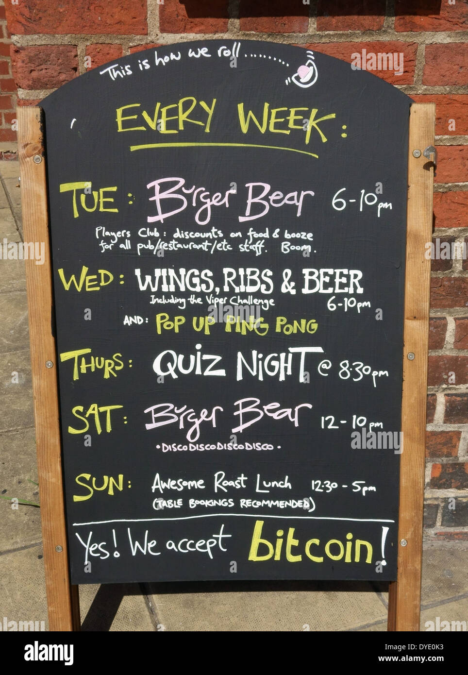 Sign outside South London pub that accepts Bitcoin payments Stock Photo
