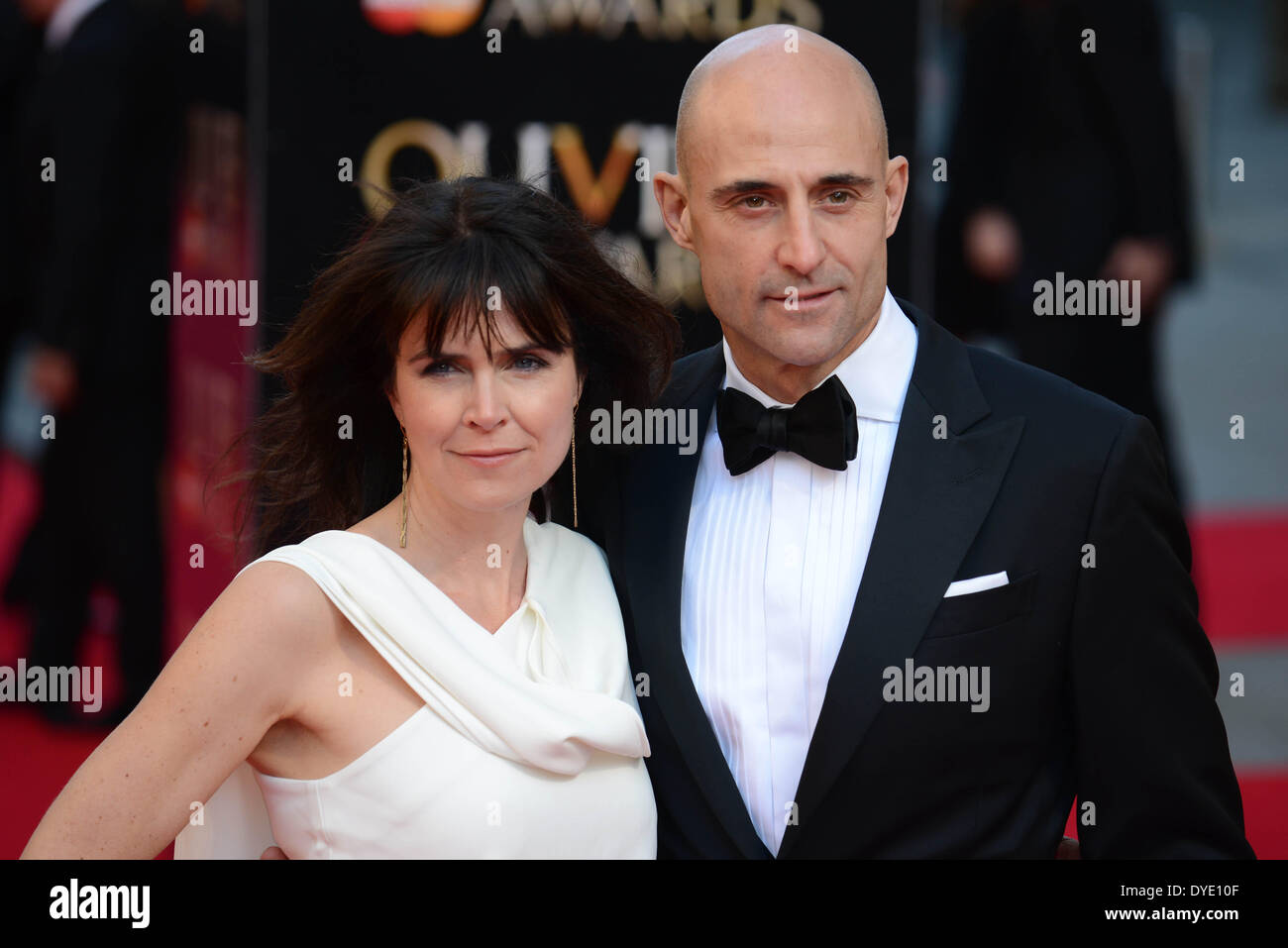 LONDON, ENGLAND - APRIL 13: Liza Marshall; Mark Strong attends the Laurence Olivier Awards at The Royal Opera House on April 13, 2014 in London, England. (Photo by See Li) Stock Photo