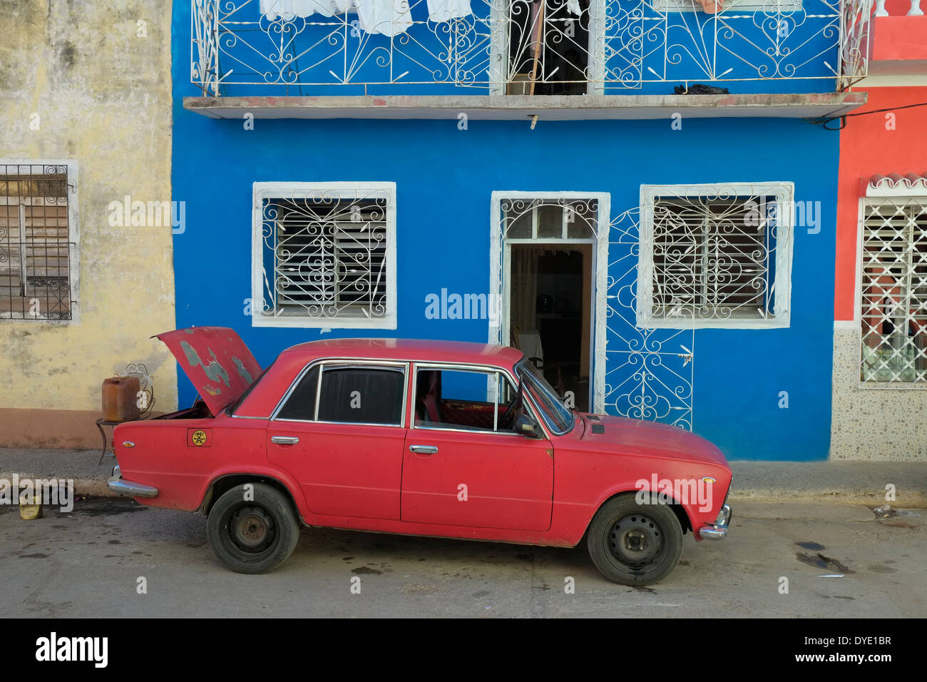 An old Lada car in a residential street, Trinidad, Cuba. Stock Photo