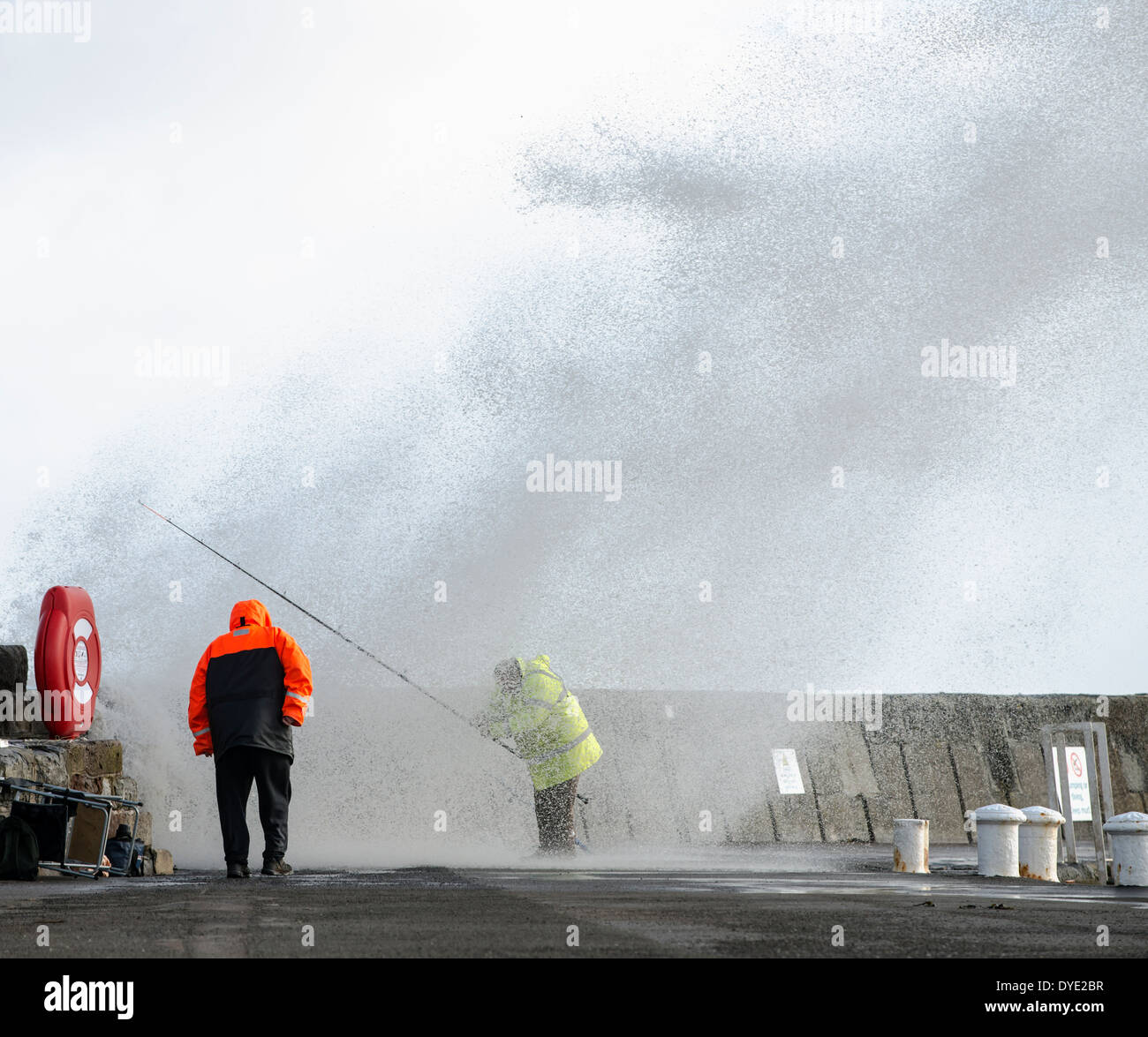 Fishing in stormy Weather Stock Photo