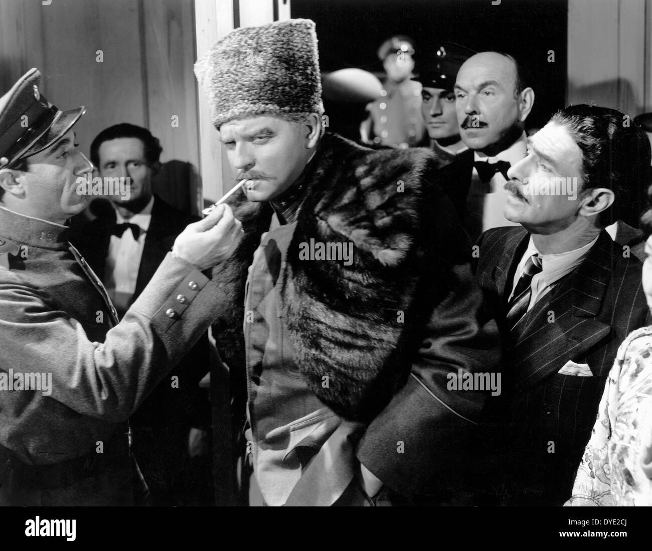 Orson Welles (center), on-set of the Film, 'Journey into Fear', 1943 Stock Photo