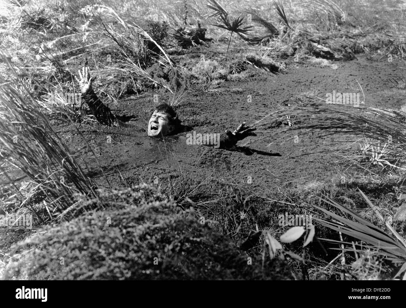 Man Sinking In Quicksand On Set Of The Film Two Thousand