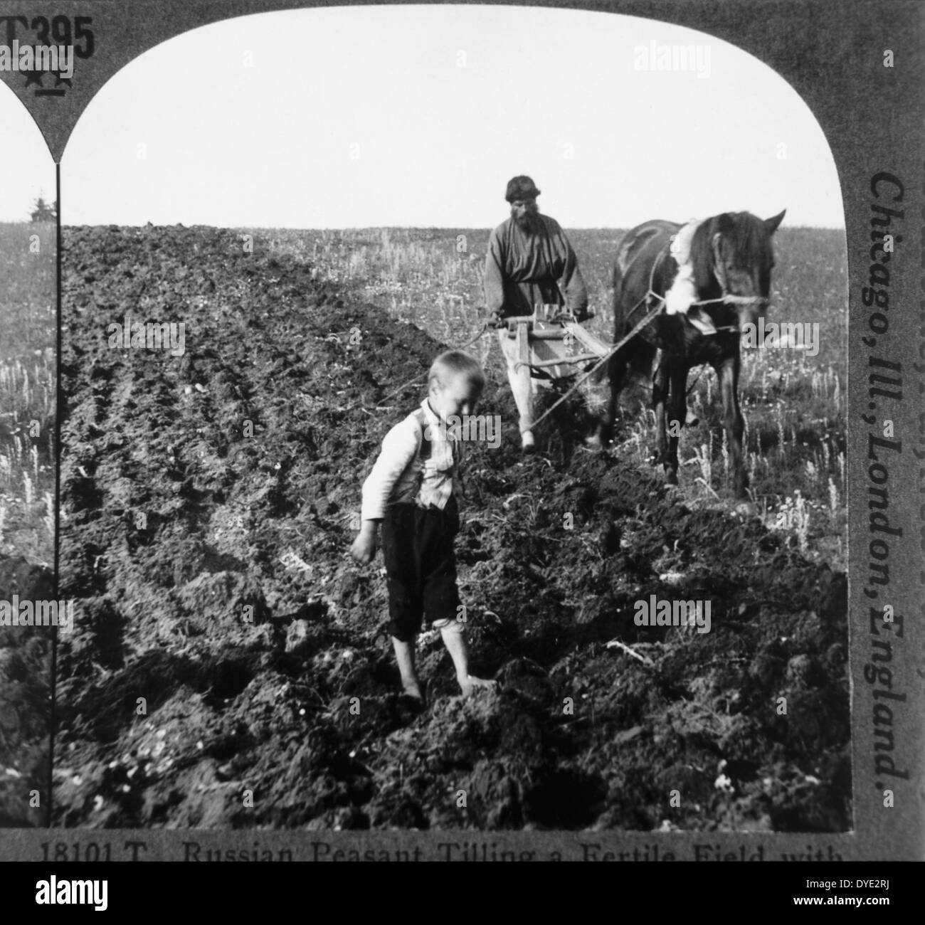 Farmer and Child in Field with Horse-Drawn Plow, Russia, circa 1900 Stock Photo