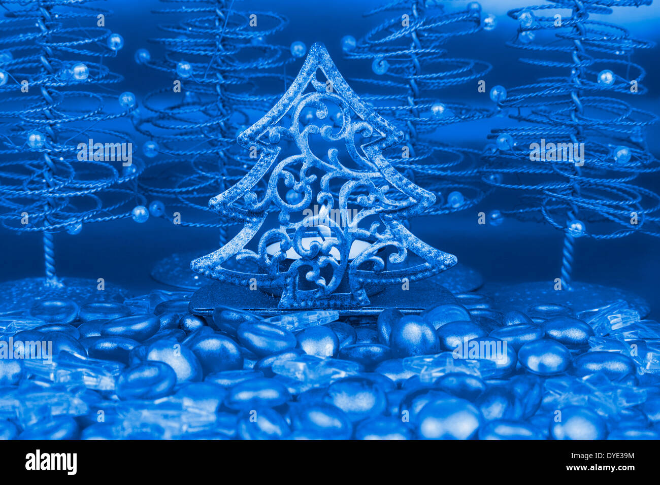 Christmas tree shaped tea light holder with blue clear glass stars and