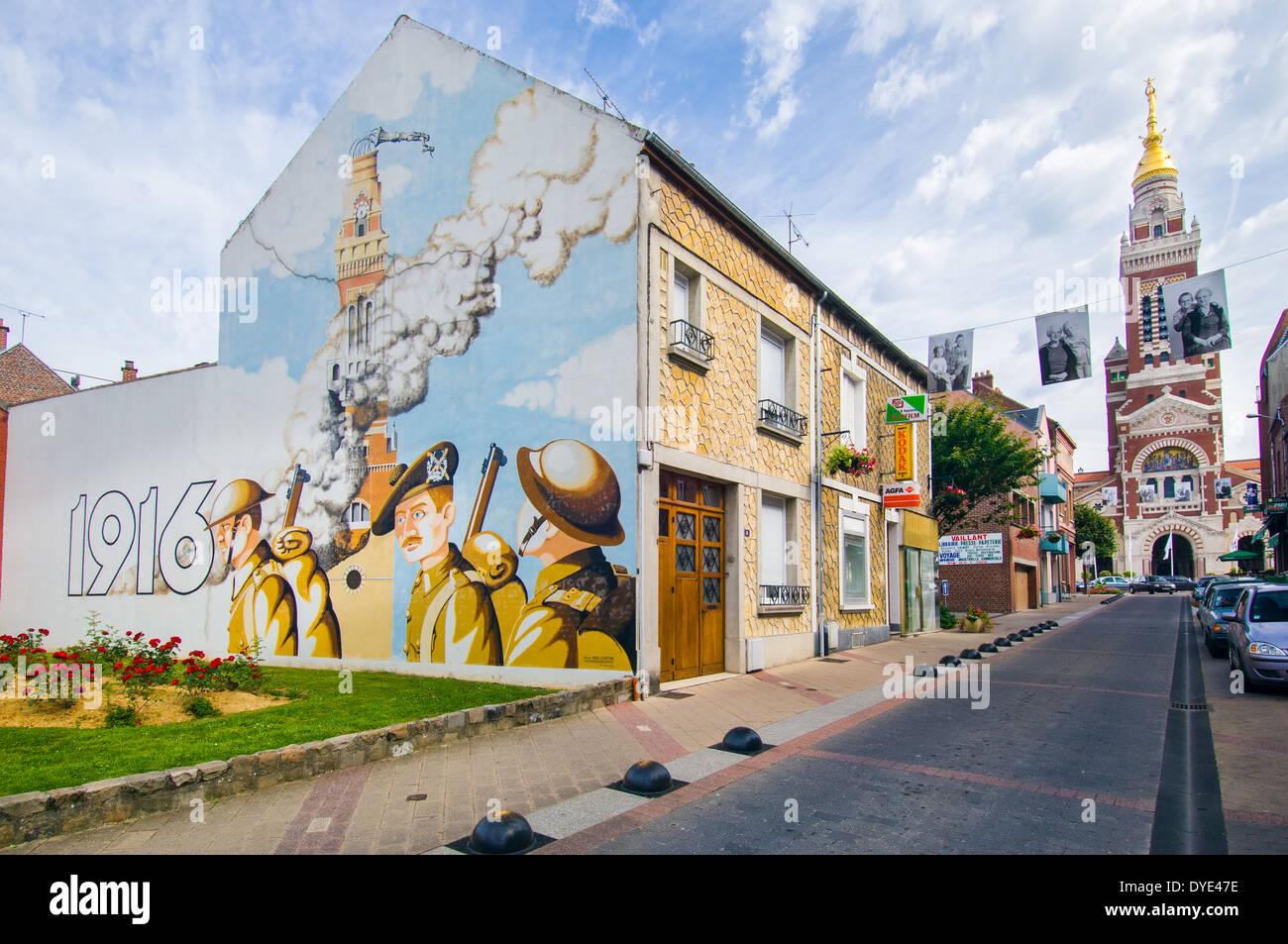 A mural on the wall of a home in the French town of Albert on the Somme, France. Commemorating events in 1916 during WW1 Stock Photo
