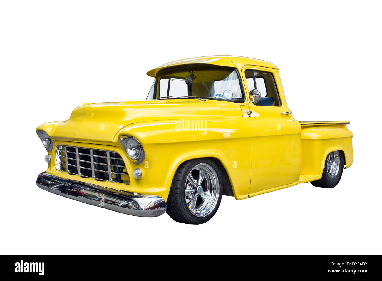 A cut out retro American yellow Chevrolet custom pick-up truck Stock Photo
