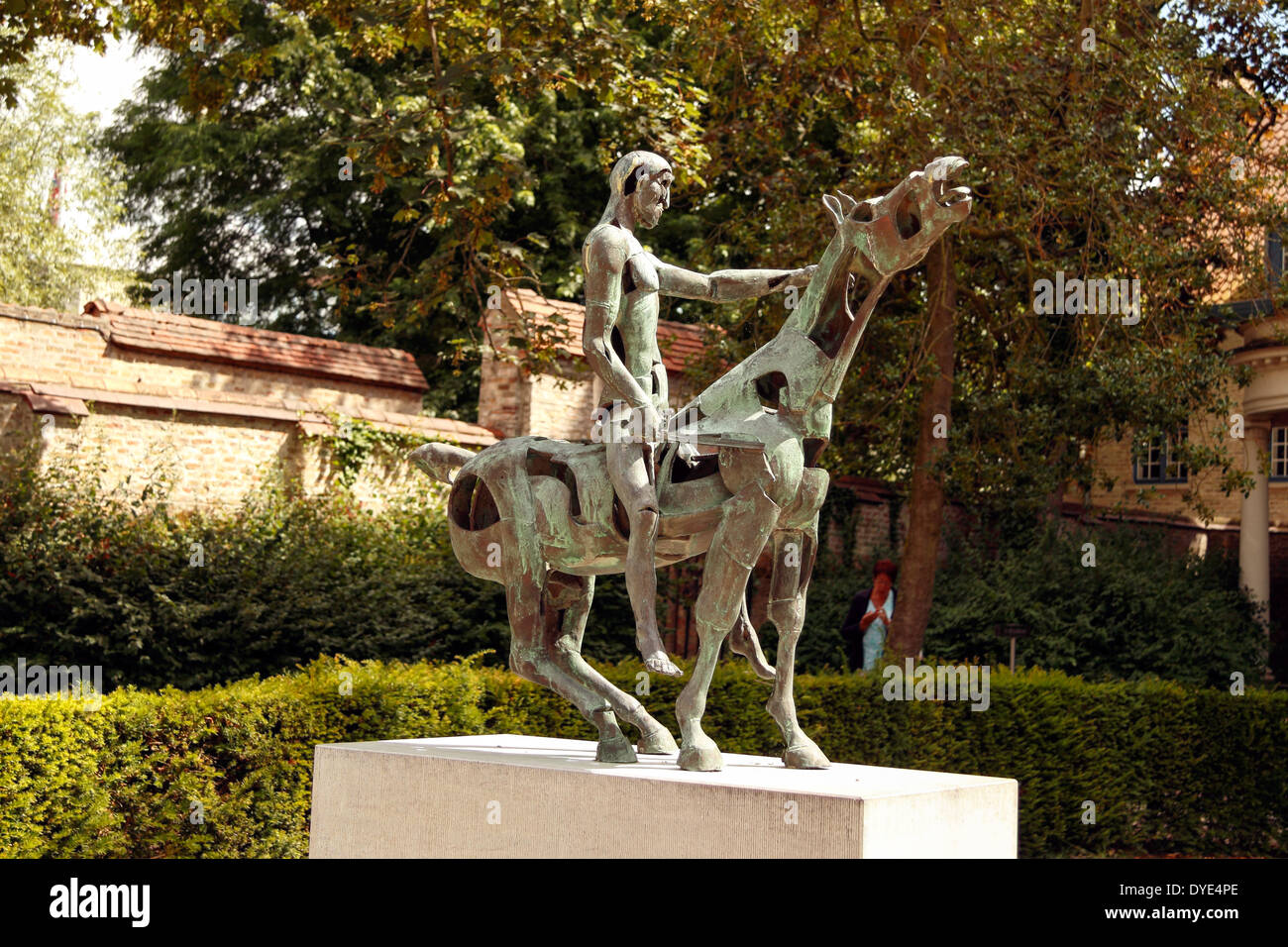Statue of one of the Four Horsemen of the Apocalypse, Arendts Garden, Bruges, Belgium Stock Photo