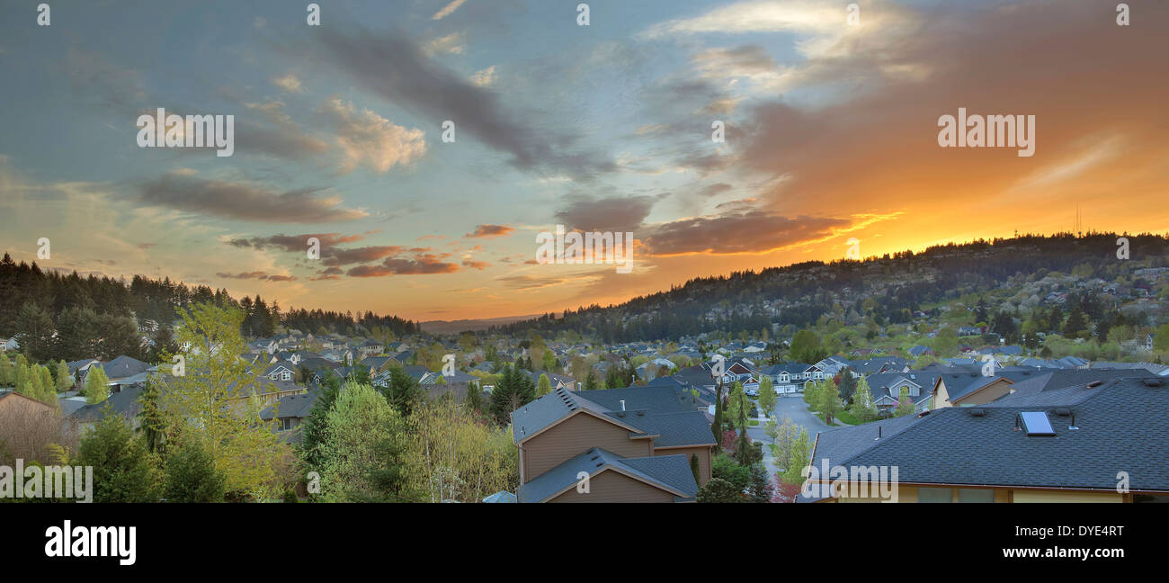 Sunset Over Happy Valley Oregon Suburb Neighborhood Homes Nestled in the Valley and the Hills Panorama Stock Photo