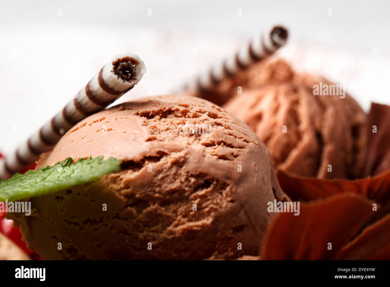 Chocolate ice cream with striped wafer biscuits Stock Photo Alamy