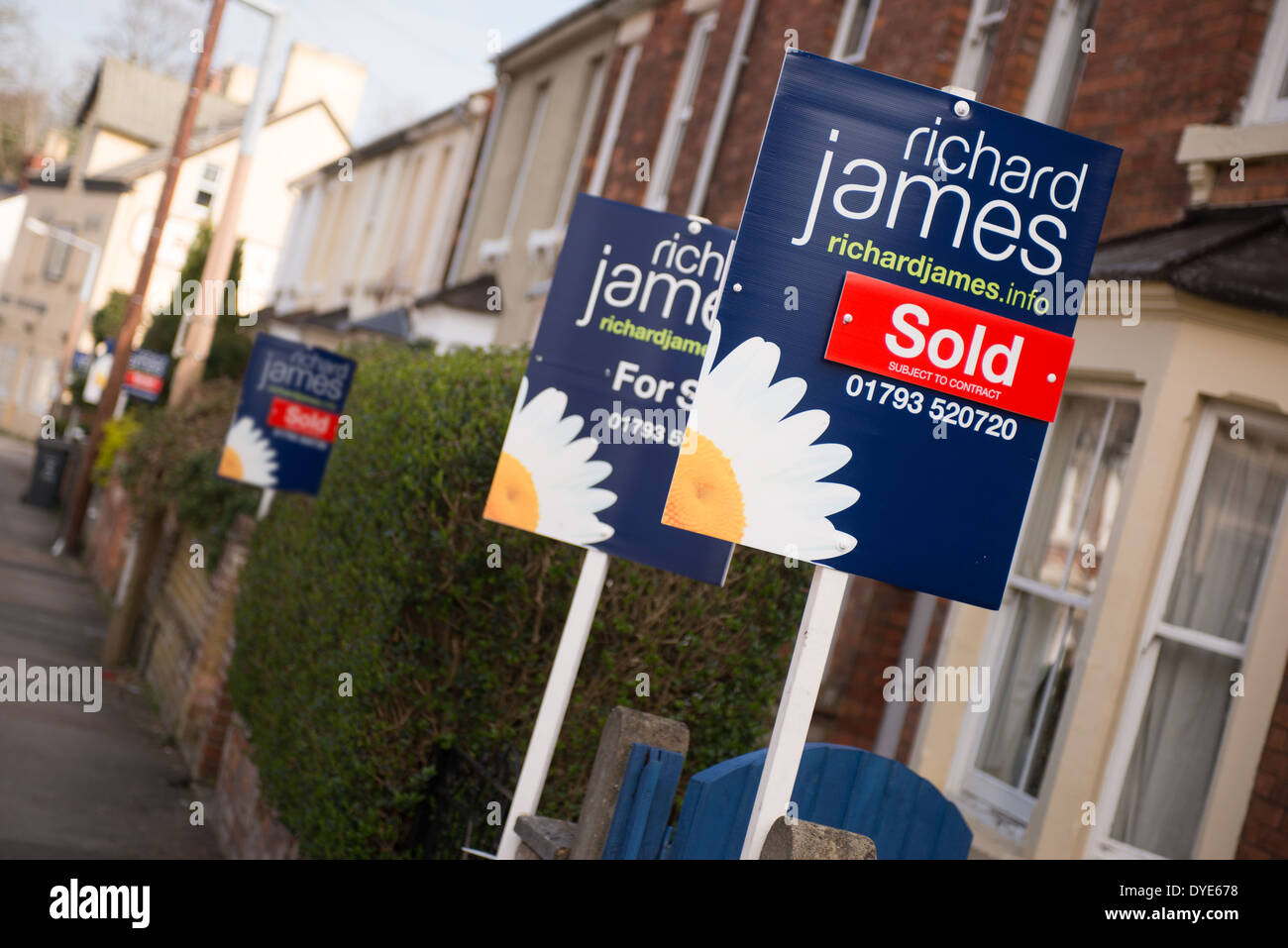 The marketing for sale sign boards of local estate agent Richard James