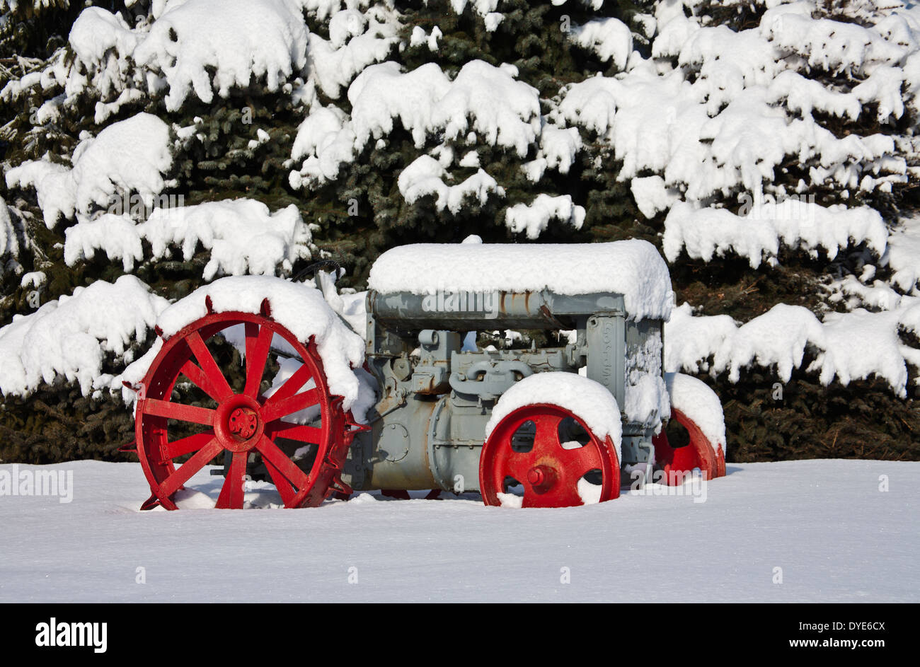 Retro winter images, vintage Fordson antique tractor close up with red wheels snow covered in New Jersey, USA, Christmas scene, File sz. 7.41 MB, Stock Photo