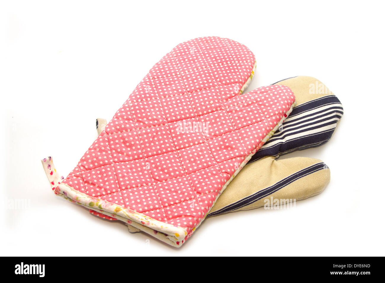 quilted heat protective mitten, kitchen utensils Stock Photo