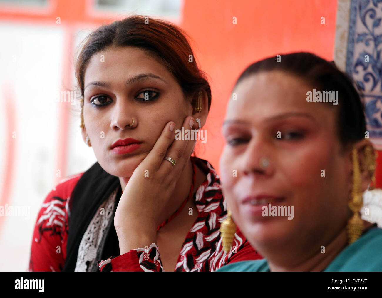 Bhopal, India. 15th Apr, 2014. Transgenders pose for photos at their home after a historic judgement given by India's Supreme Court, in Bhopal, India, April 15, 2014. India's Supreme Court Tuesday granted legal recognition to transgenders as the third gender in an iconic judgement which will enable them to get all facilities, including a passport, election identity card and driving licence. © Stringer/Xinhua/Alamy Live News Stock Photo
