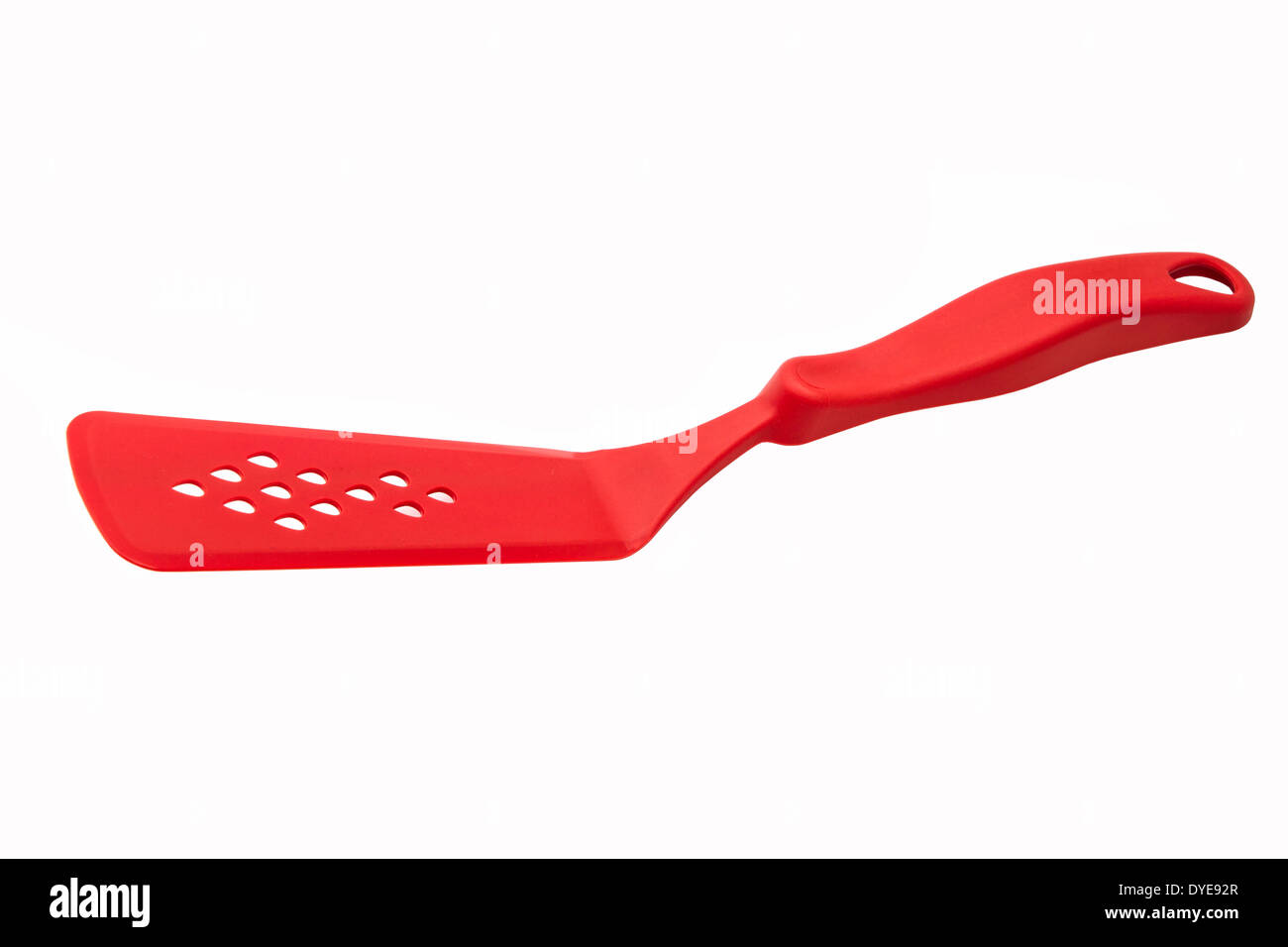 Red kitchen spatula on a white background Stock Photo
