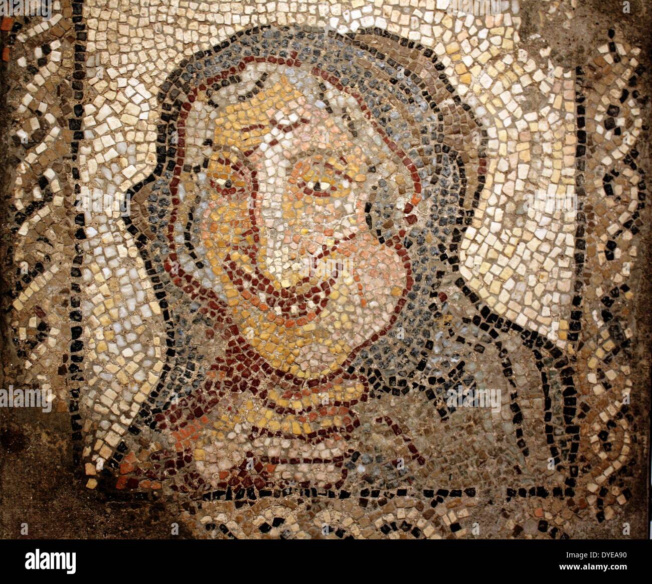 Ancient Roman mosaic with the representing an old Woman. Barcelona, Spain 2013 Stock Photo