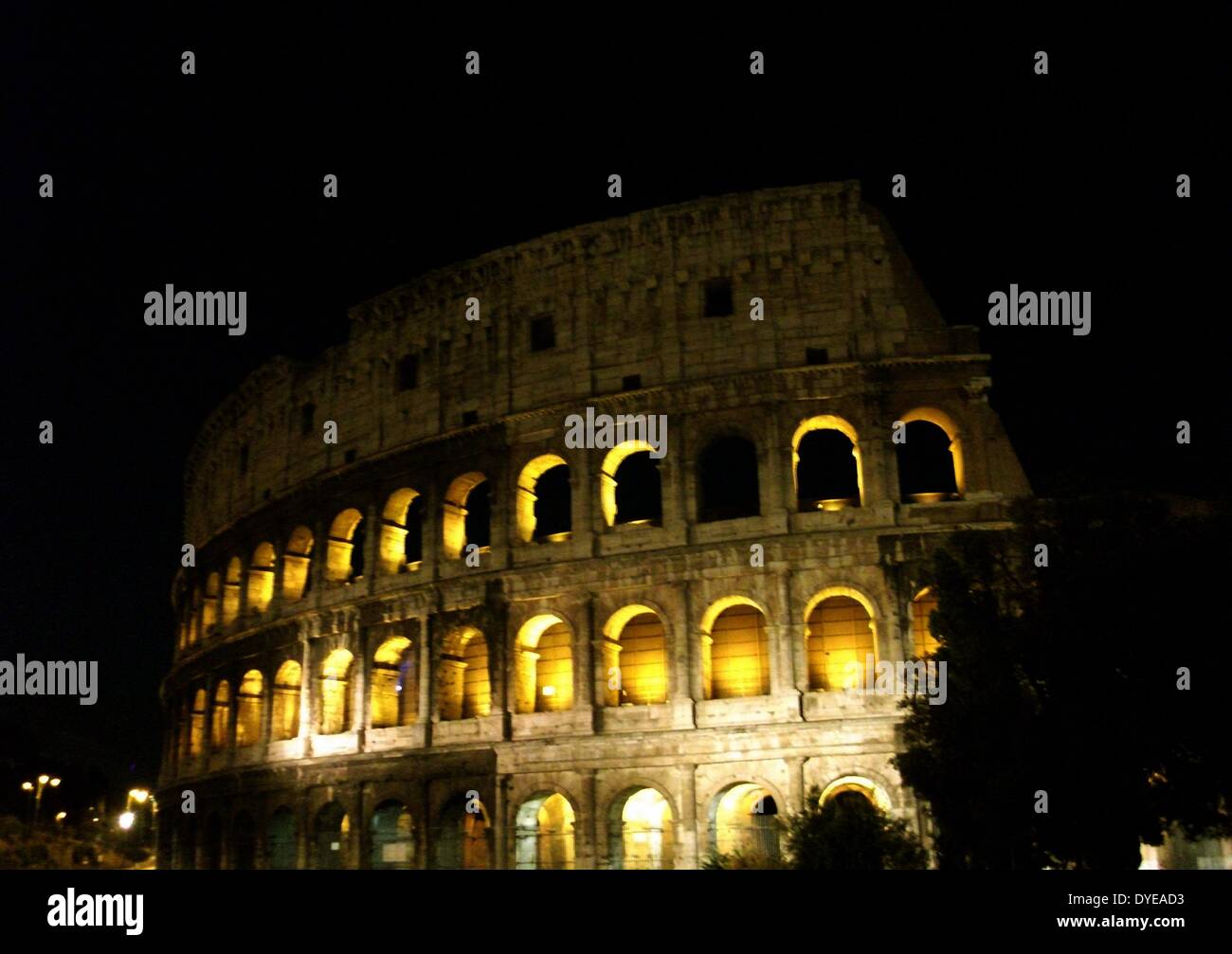 Night time view of the Colosseum, an elliptical amphitheatre in the centre of the city of Rome. Built 70-80 AD. Rome. Italy 2013 Stock Photo