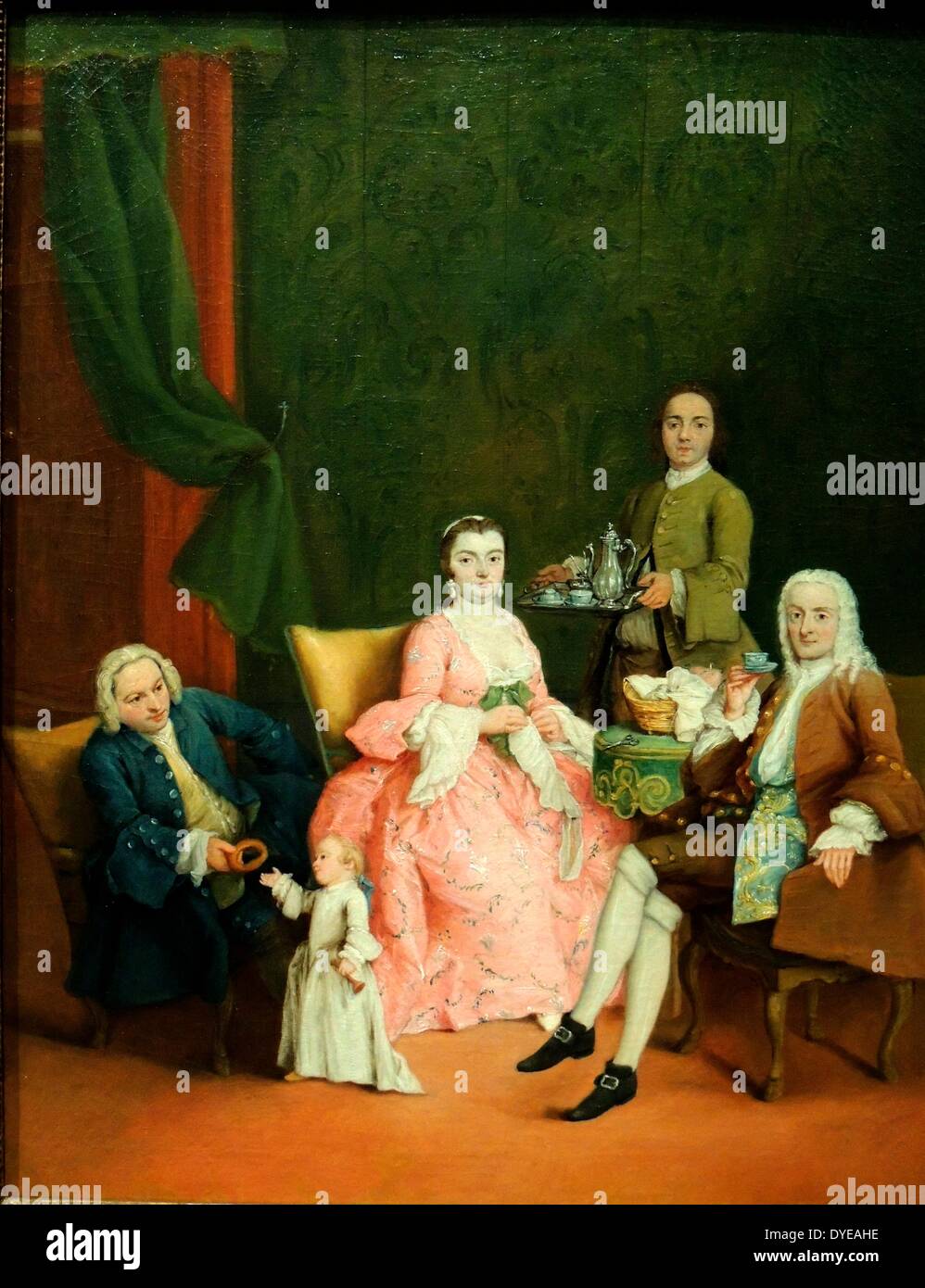 Portrait of a Venetian Family with a Manservant Serving Coffee by Pietro longhi (1702-1785) oil on canvas, c1752. In his paintings, Longhi usually poked gentle fun at the everyday activities of the Venetian elite. This is not, however the case here. It is simply a portrait of a family drinking coffee, with the lady of the house taking centre stage. The conspicuous inclusion of the servant is noteworthy. He must have been a valued member of the household. Stock Photo