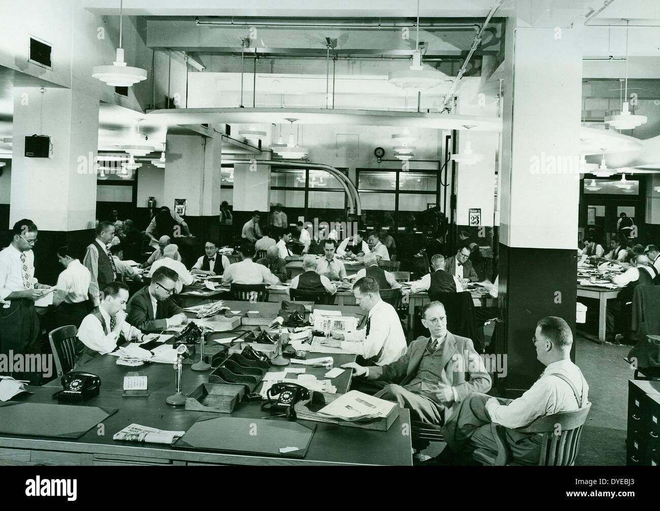 journalists sitting in a news room at an American newspaper office circa  1945 Stock Photo - Alamy