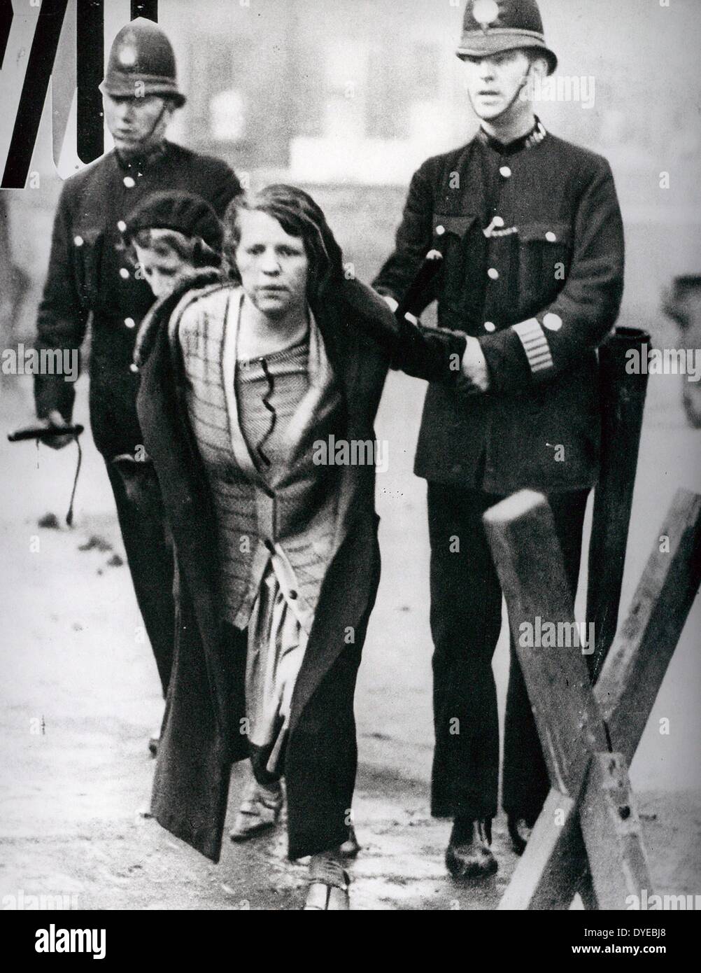 Suffragette arrested by police during a protest for women's suffrage (voting) circa 1910-12 Stock Photo