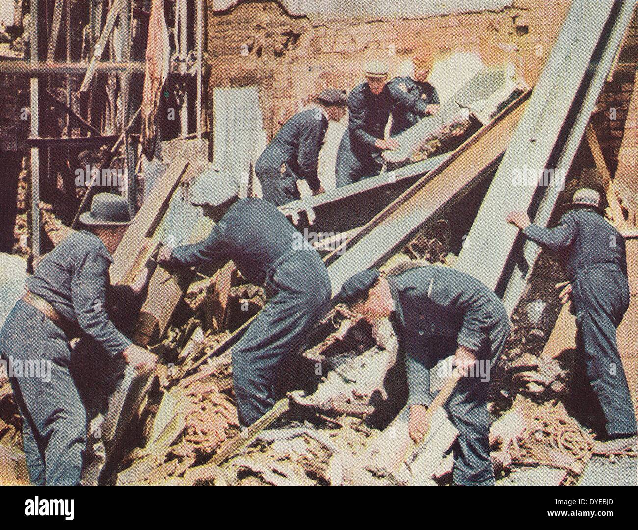 rescue workers after an air raid on London during World war Two. 1940 ...