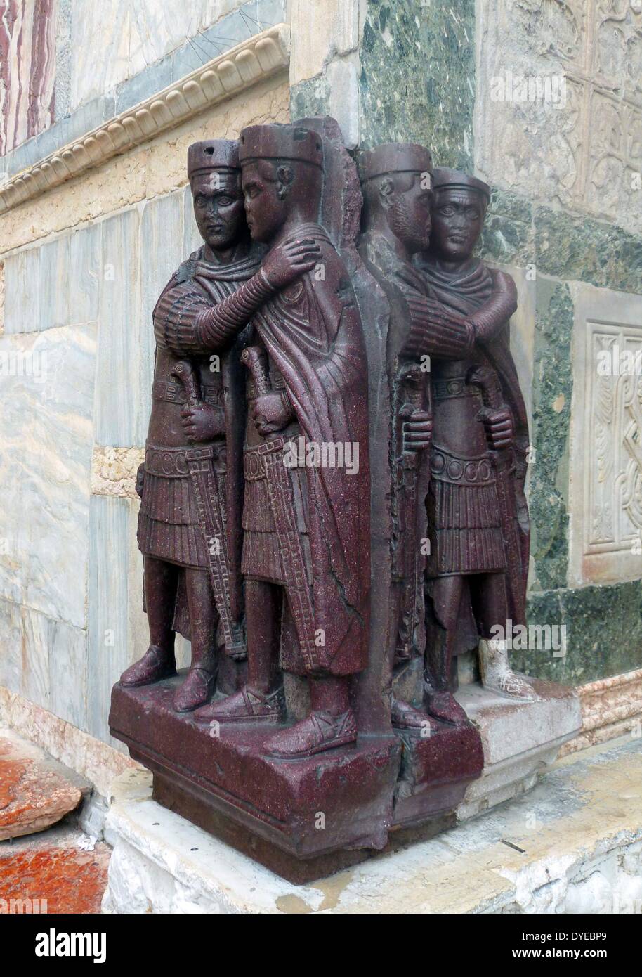 The Portrait of the Four Tetrarchs. A Porphyry sculpture group of four Roman emperors dating from around 300 AD. Fixed to a corner façade of St Mark's Basilica in Venice in the Middle Ages. Venice. Italy 2013 Stock Photo