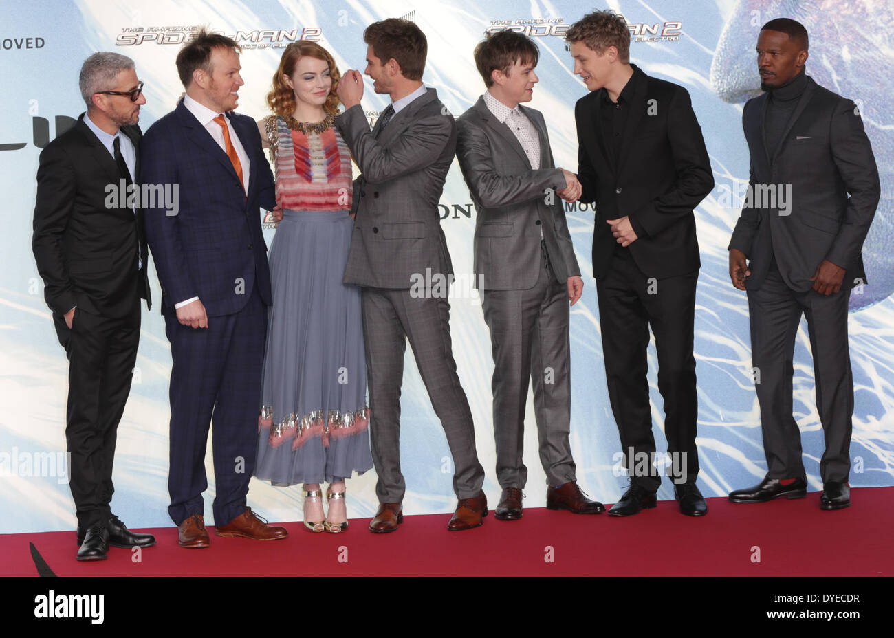 Berlin, Germany. 15th Apr, 2014. Film producer Matt Tolmbach (L-R), US director Marc Webb, and US actors Emma Stone, Andrew Garfield, Dane DeHaan and Jamie Foxx pose with German musician Tim Bendzko (2-R) as they arrive for the German premiere of the film 'The Amazing Spiderman 2: Rise of Electro' in Berlin, Germany, 15 April 2014. The film will be released in German theatres on 17 April 2014. Credit:  dpa picture alliance/Alamy Live News Stock Photo