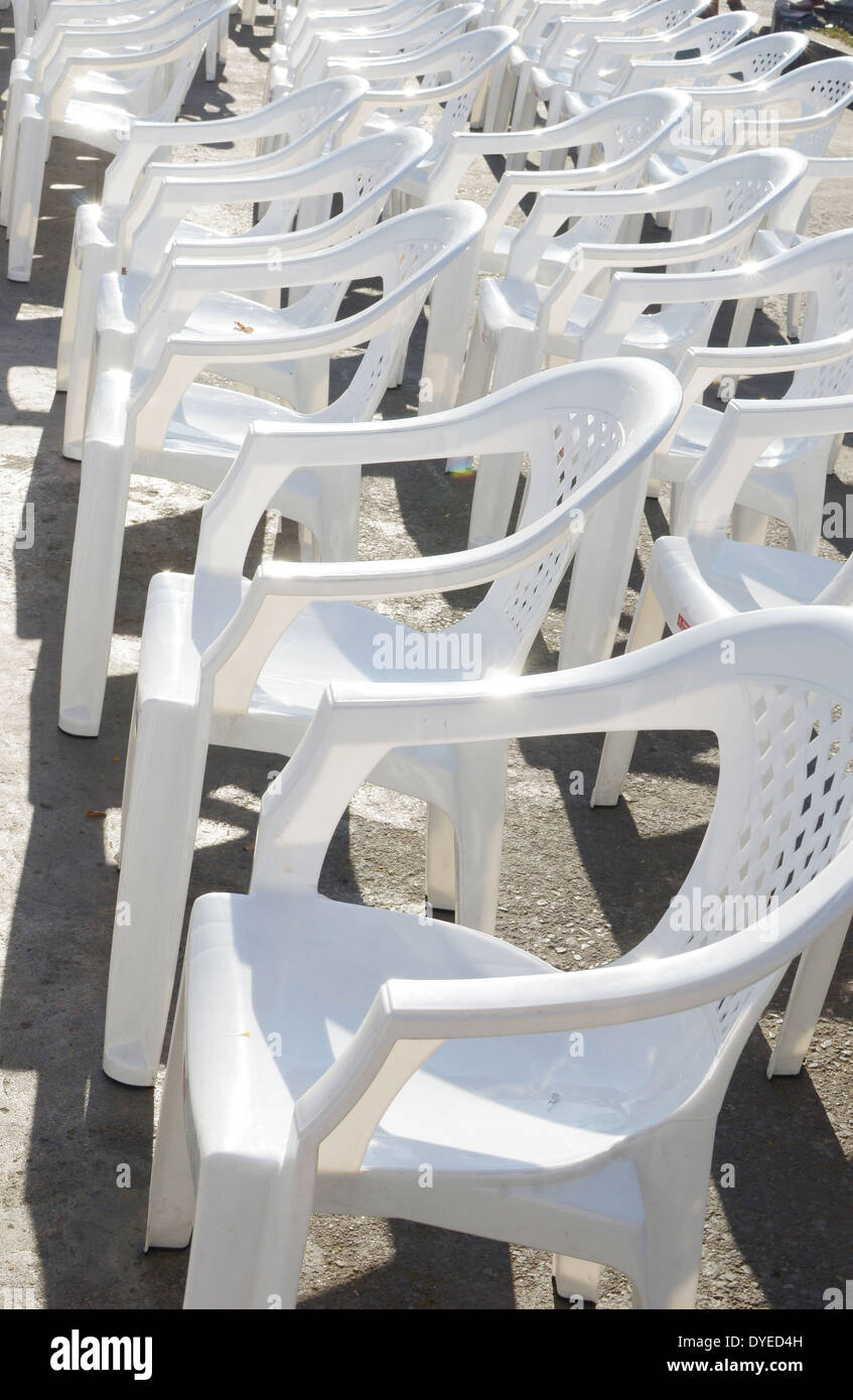 white plastic chairs outdoor Stock Photo