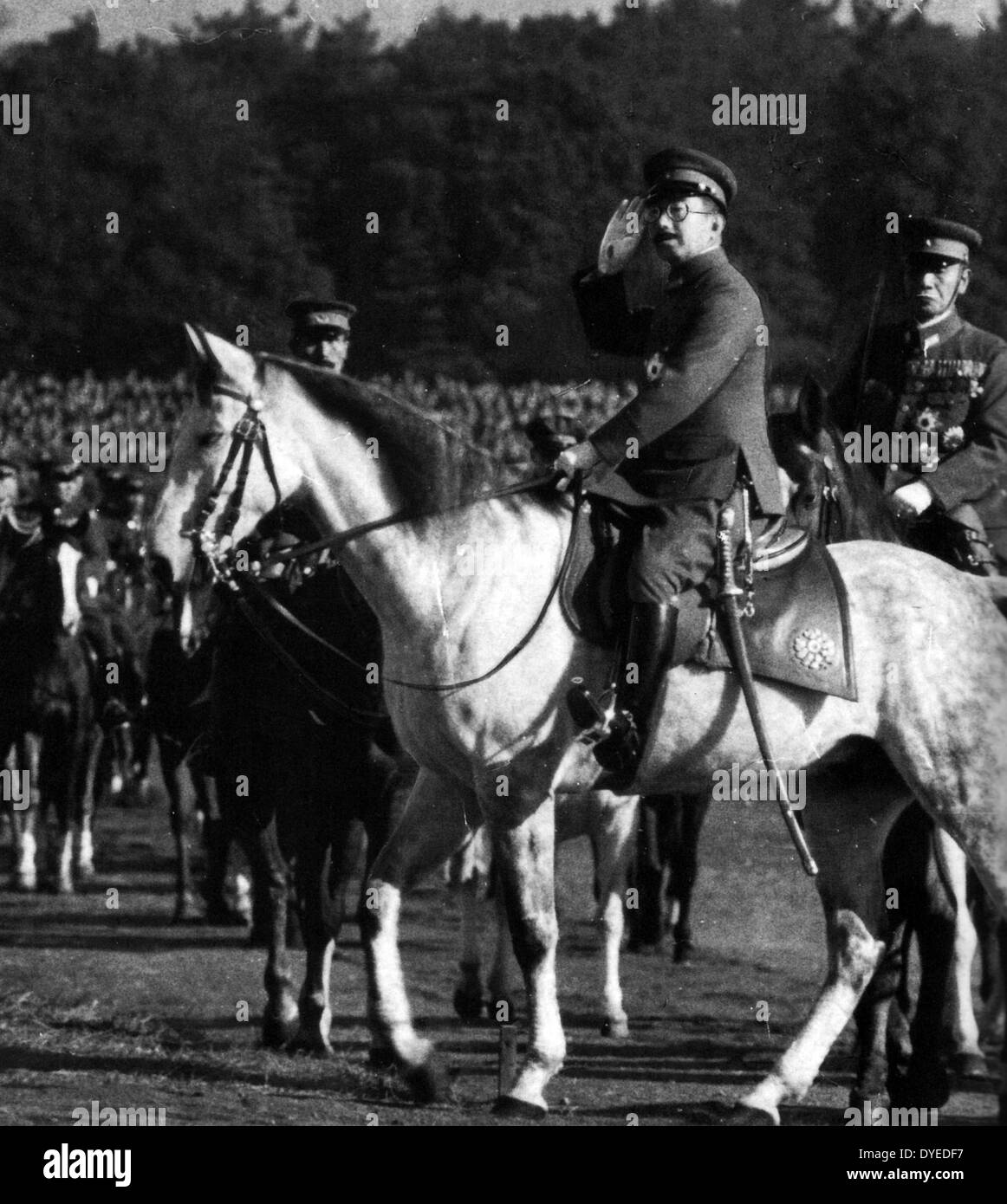 Emperor Hirohito (Showa) salutes army parade 1936 Stock Photo