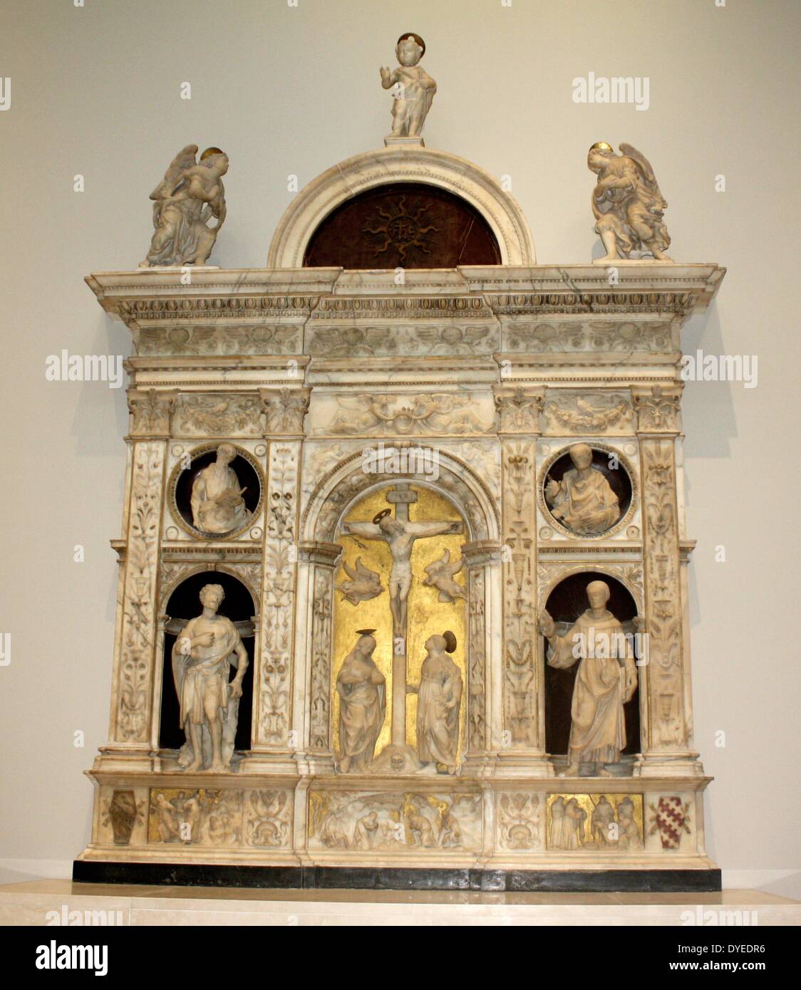 Altarpiece with the Crucifixion Flanked by Saints 1493. By Andrea Ferrucci Stock Photo
