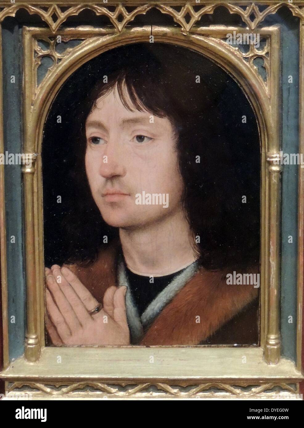 Portrait of a Young Man at Prayer by Hans Memling 1487 A.D. Stock Photo