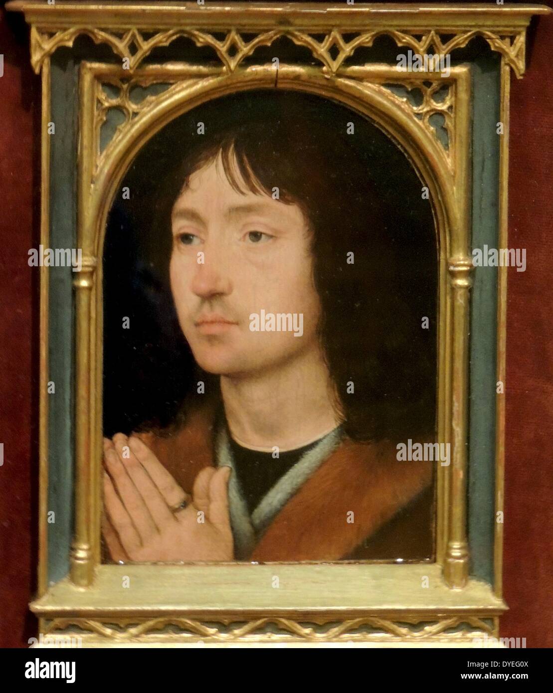 Portrait of a Young Man at Prayer by Hans Memling 1487 A.D. Stock Photo