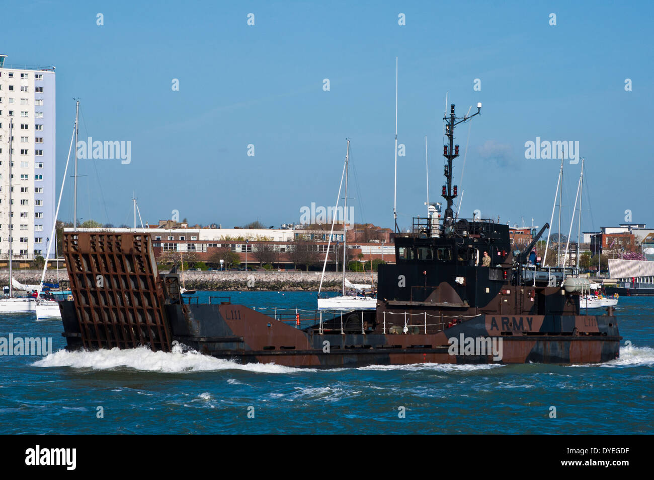 Army landing craft leaving Portsmouth harbour Stock Photo