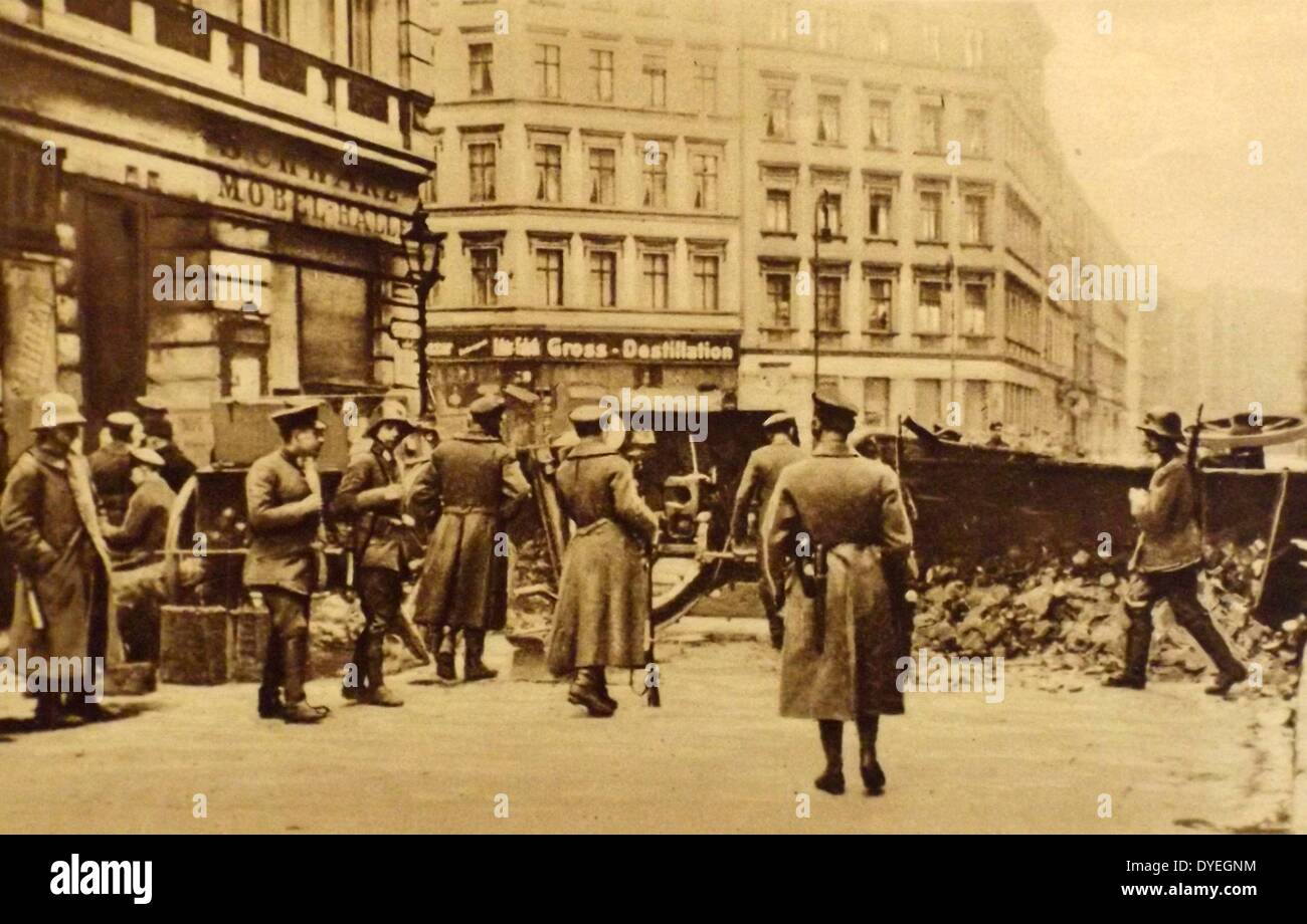 Government troops move against spartacist positions in Berlin. 1919. The Spartacist uprising (German: Spartakusaufstand), was a general strike and the armed battle in Germany from January 4 to January 15, 1919. Its suppression marked the end of the German Revolution. The name 'Spartacist uprising' is generally used for the event even though neither the 'Spartacist League' nor the Communist Party of Germany led this uprising; each participated only after popular resistance had begun. Stock Photo