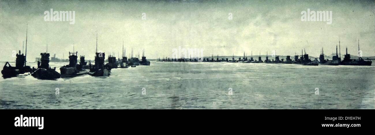 World War 1 - 'U boat Avenue, Harwich' England: Interned German submarines moored three abreast in the Stour: Vistas of pirate ships surrendered to Admiral Sir Reginals Tyrwhitt, November 20-27, 1918. Stock Photo