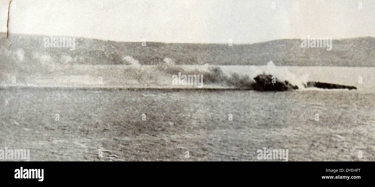 World War I - The French battleship 'Bouvet' sinking near gallipoli 1915. In World War I, she escorted troop convoys from North Africa to France. She then joined the naval operations off the Dardanelles, where she participated in a major attack on the Turkish fortresses in the straits on 18 March 1915. During the attack, she struck a mine and sank within two minutes; only some 50 men were rescued from a complement of 710. Stock Photo