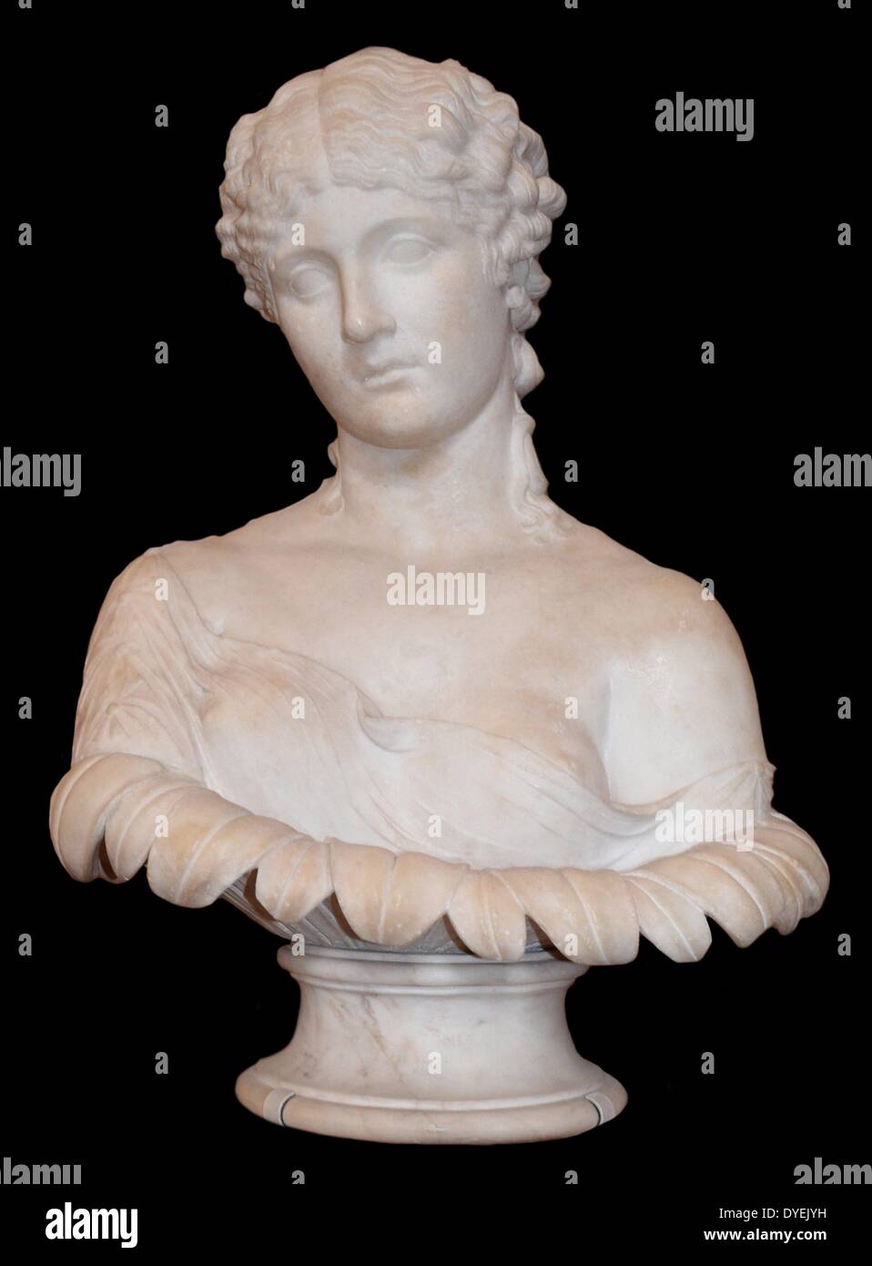 Marble Bust Portrait of Clytie 47 A.D. The bust depicts a woman emerging from a calyx of leaves. The woman is thought to have been a nymph whom had fallen in love with the God Helios and was subsequently turned into a sunflower. Stock Photo