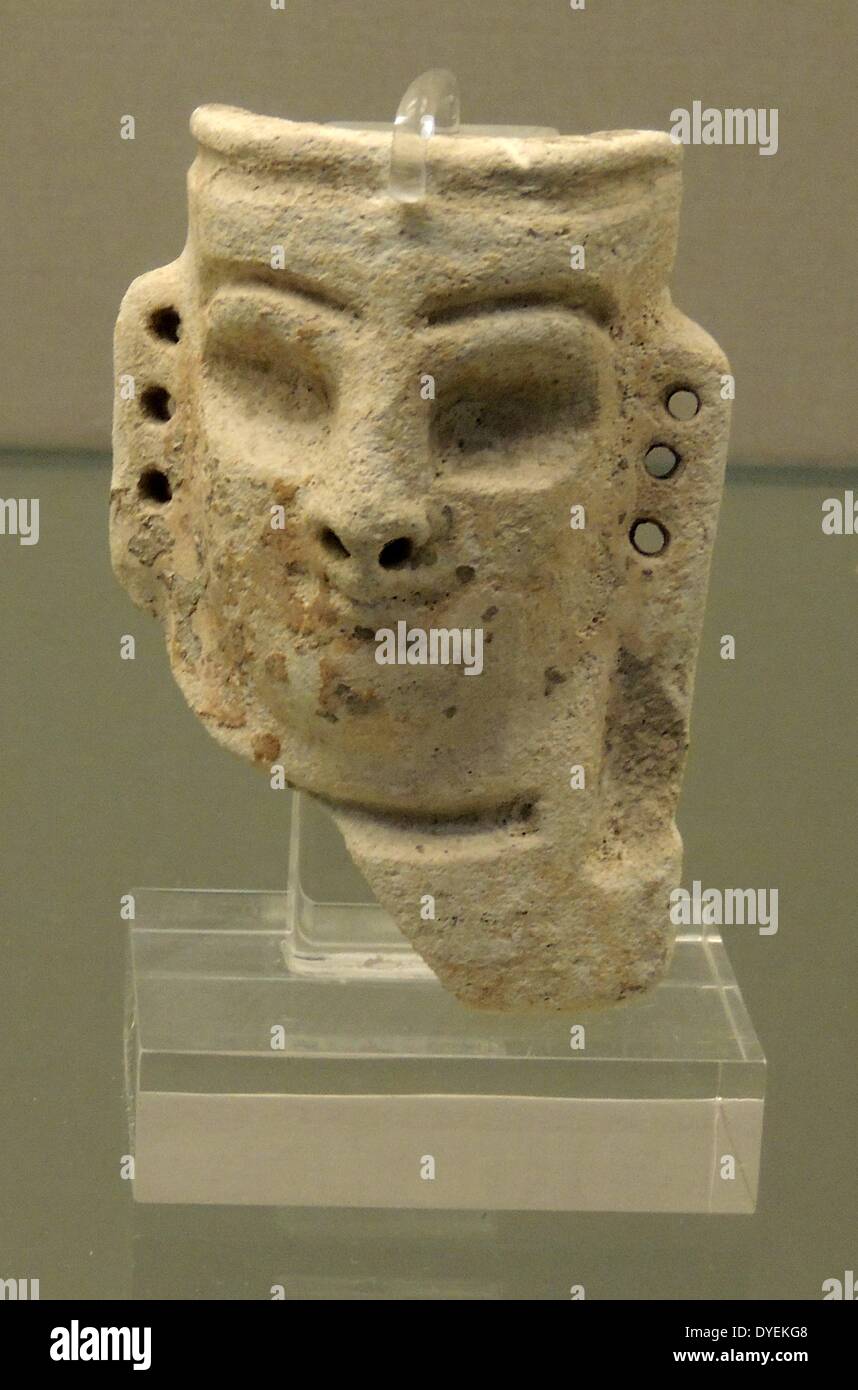 Female Faience Mask 1300 B.C. Was most likely attached to a wooden statue. Sippar Stock Photo