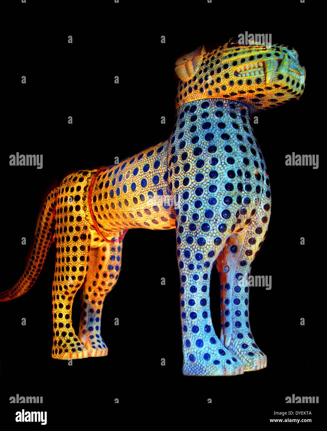 One of a Pair of Ivory, Copper and Coral Leopards 1924. Benin Stock Photo