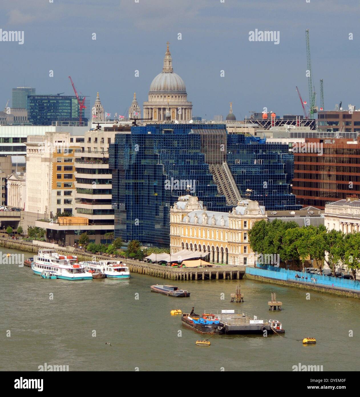 View of the Dome of St Paul's Cathedral from the Thames London 2013.  Church of England cathedral, the seat of the Bishop of London and mother church of the Diocese of London. Completed in 1720 in an English Baroque style. Stock Photo