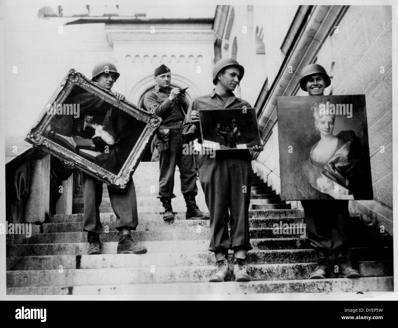 American soldiers in Germany recover and document stolen paintings after the collapse of the Nazi regime 1945 Stock Photo