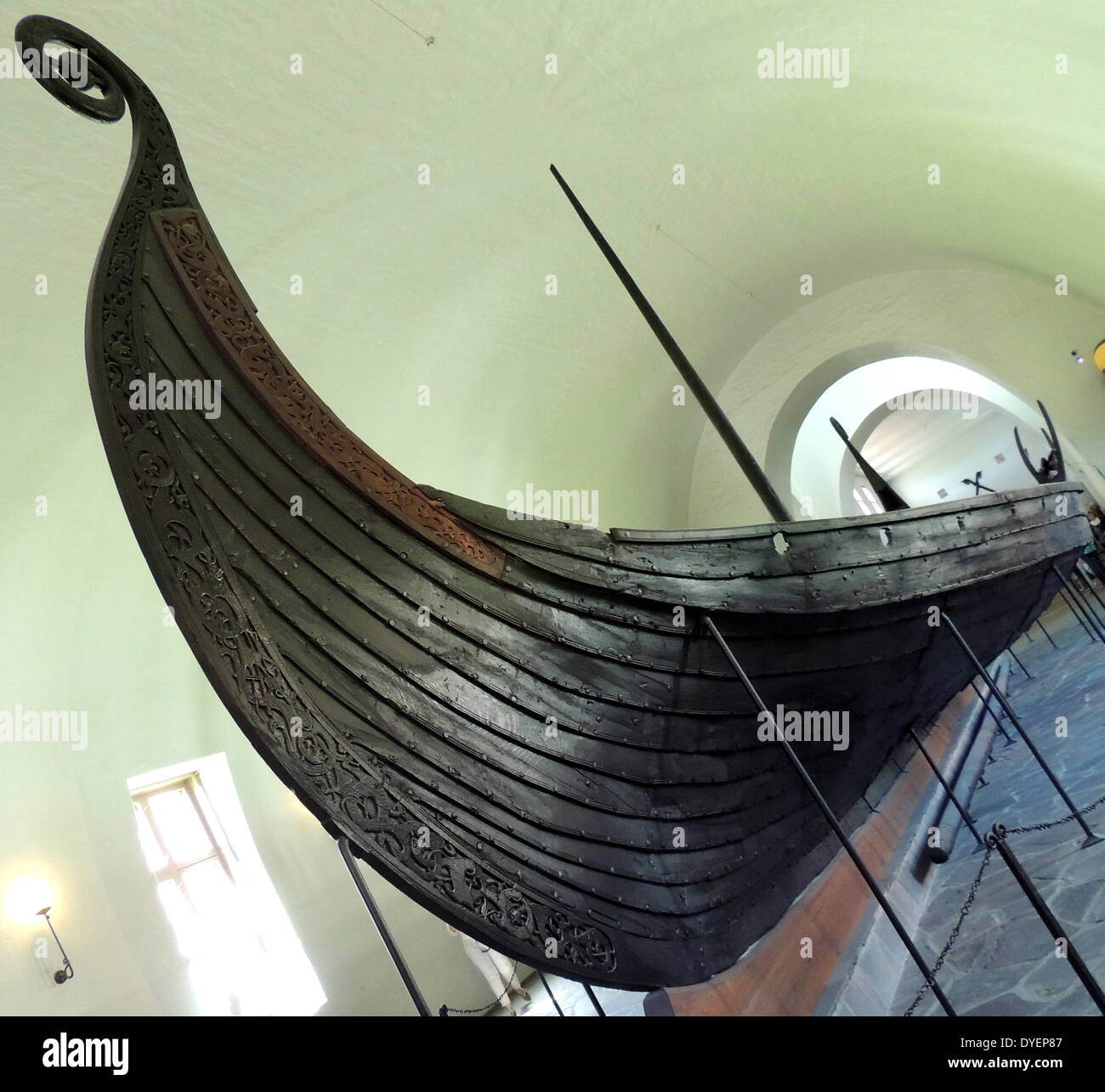 The Oseberg ship . A Viking ship discovered in a large burial mound at the Oseberg farm near