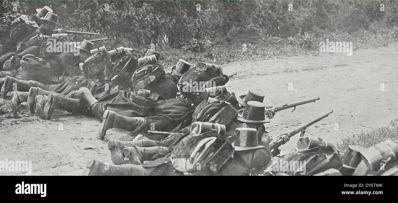 The Belgian army carabinieri wearing their legendary leather top hats are defending a road. World War One, Belgium 19140101 Stock Photo