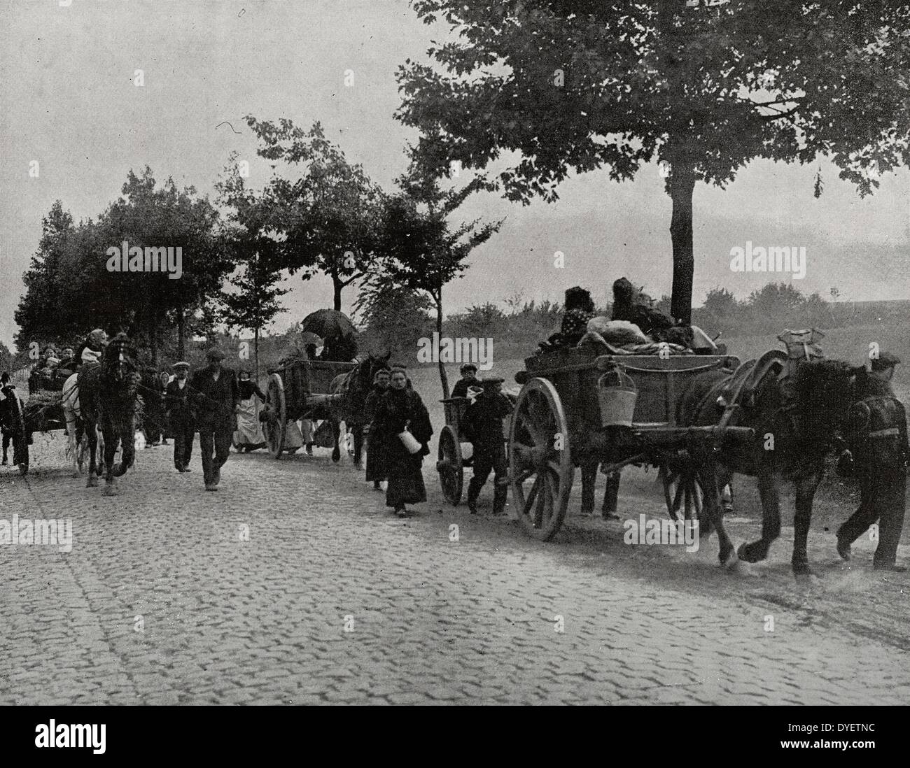 The inhabitants of the Belgian countryside fleeing by road. World War I 19140101 Stock Photo