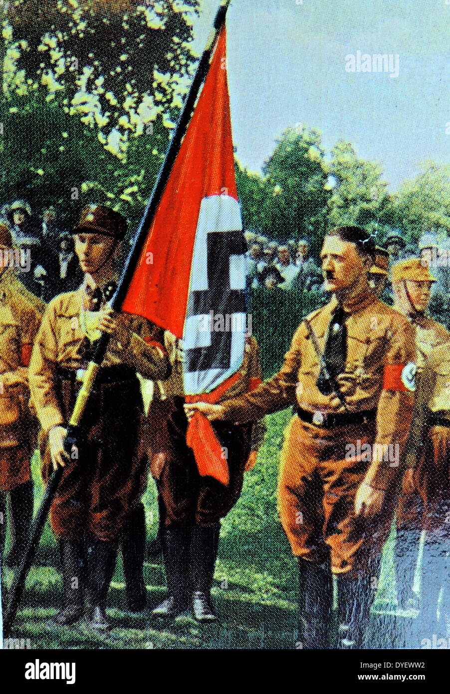 Hitler holds a Nazi flag just before the launching of the Munich Beer hall Putsch 1923 Stock Photo