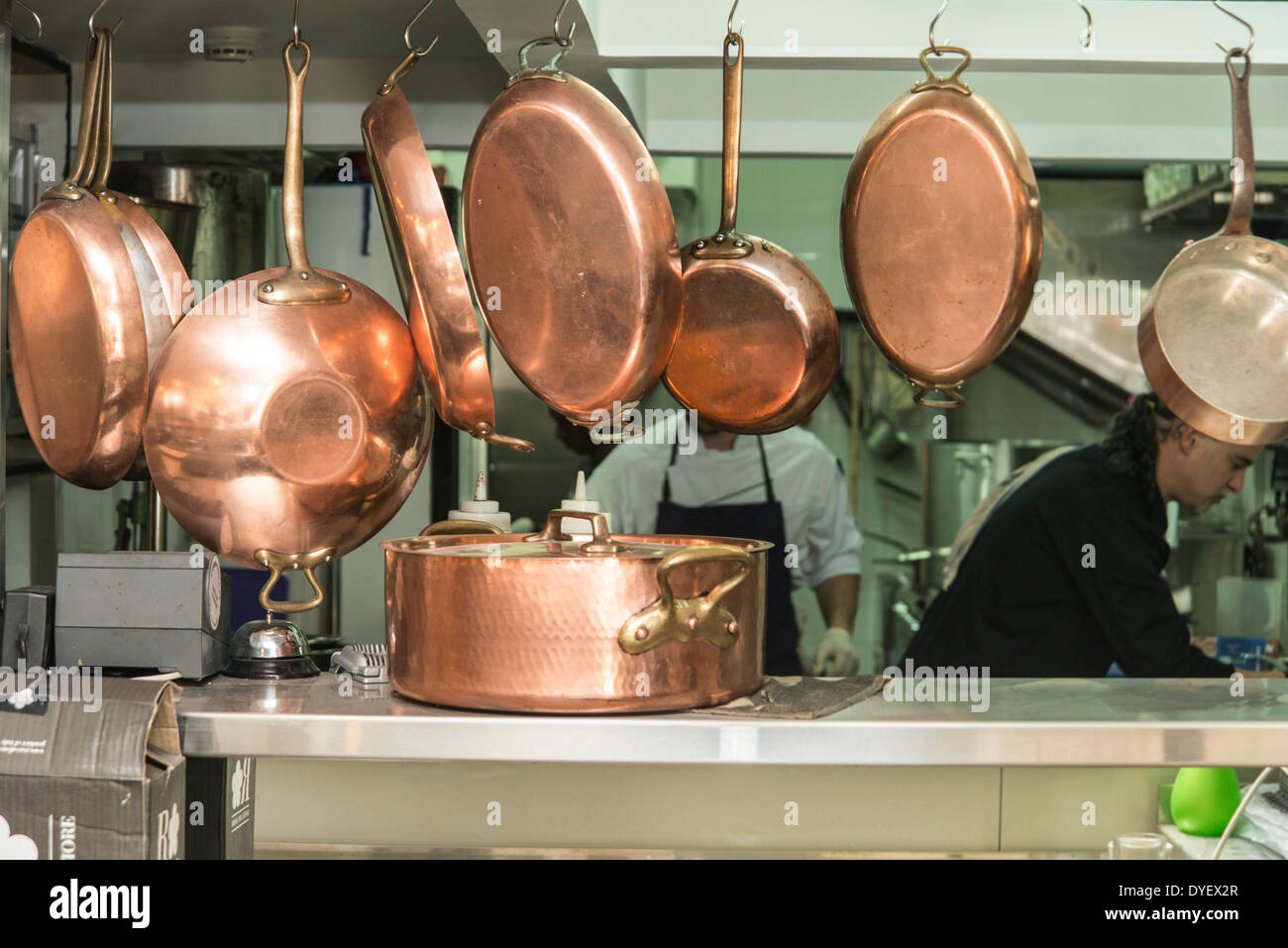 Copper pots and pans in a restaurant kitchen Stock Photo Alamy