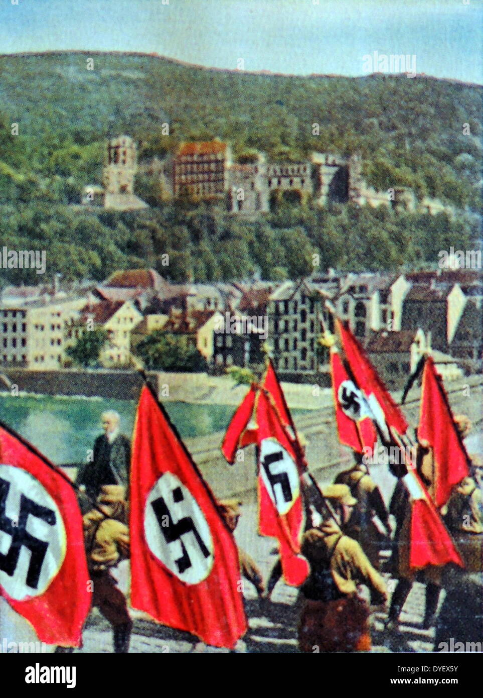 Nazi swastika flags are paraded into Heidelberg, Germany 1933 Stock Photo